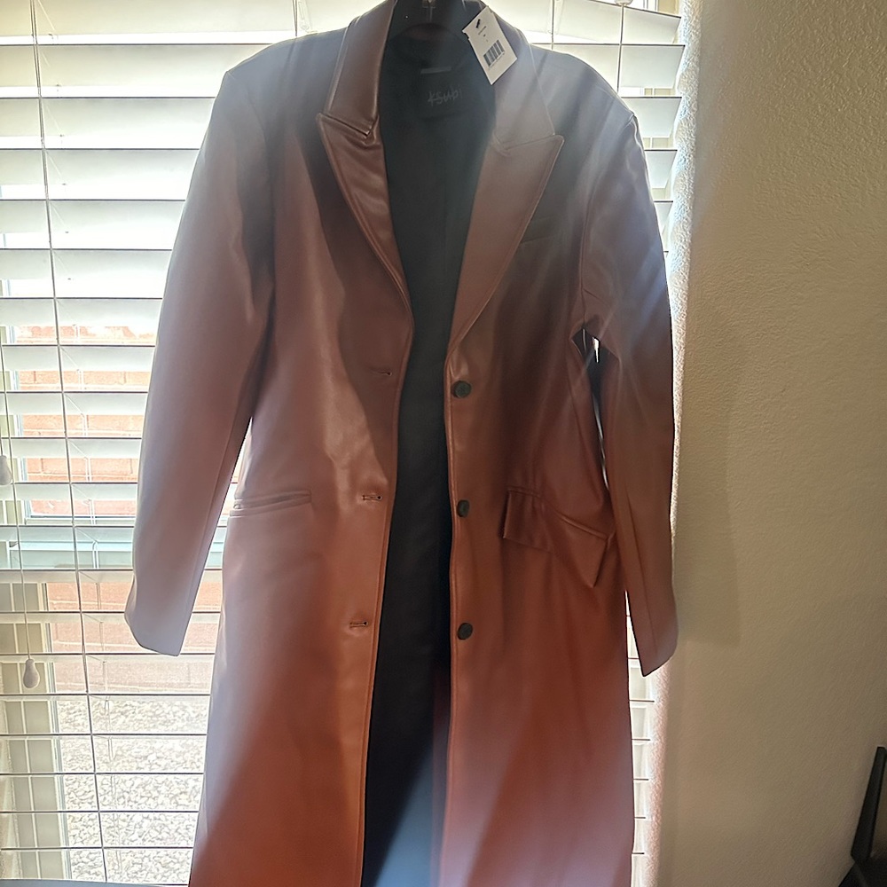 Never used brown leather jacket.